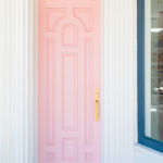 A close up of a doorway in front of a door