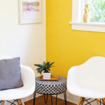 A living room filled with furniture and a table