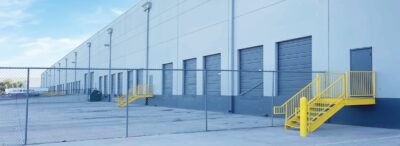A building with a metal fence