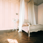 A bedroom with a bed in a room