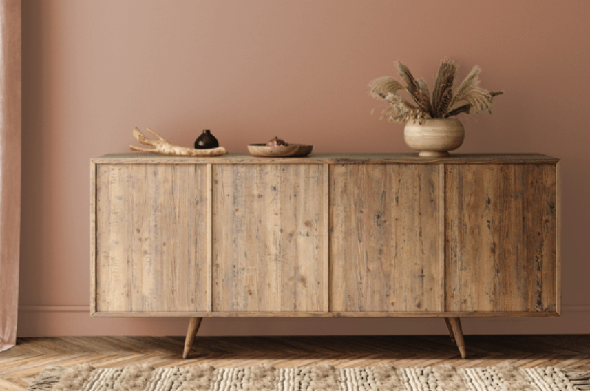 table along brown wall